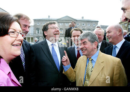 Irish Taoiseach-in-waiting Brian Cowen (third left) after he was publicly unveiled as Fianna Fail party leader-designate today outside the Dail parliament in Dublin. Stock Photo