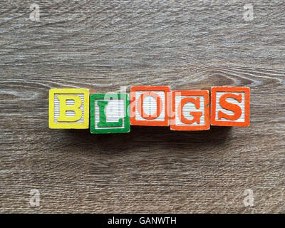 BLOGS word made with toy wood blocks letters Stock Photo