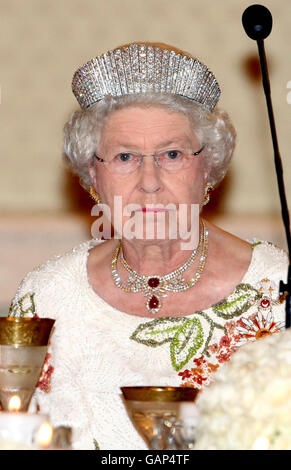 Britain's Queen Elizabeth II looks on during a State Banquet in her honour at the Presidential Palace on the first day of their State Visit to Turkey. Stock Photo