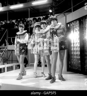 The Beatles - left to right, John Lennon, Ringo Starr, George Harrison, and Paul McCartney at Rediffusion's Wembley Studio rehearsing for 'Around the Beatles', the first British television show built around the group. Stock Photo