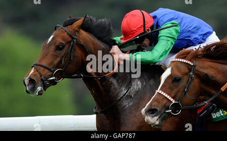 Horse Racing - bet365 Gold Cup Meeting - Day One - Sandown Racecourse. Ask ridden by Ryan Moore wins The bet365 Gordon Richards Stakes during the bet365 Gold Cup Meeting at Sandown Racecourse, Surrey. Stock Photo