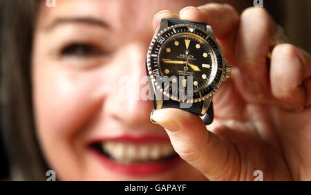 General Manager, Moia Henderson, with a Rolex worth more than 50,000 that was brought into Laing The Jeweller in Edinburgh by a customer who had no idea of it's value. Stock Photo