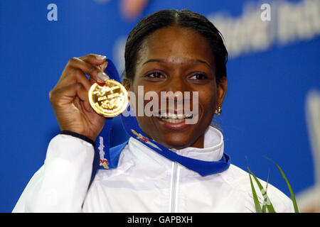 Great Britain's Ashia Hansen with her World Indoor Athletics Championships gold medal for the Triple Jump Stock Photo