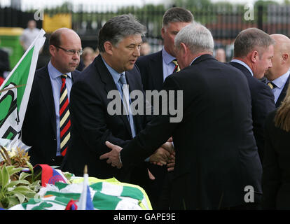 Rangers manager Walter Smith shakes hands with Celtic Chief Executive Peter Lawell at Celtic Park, Glasgow. Stock Photo