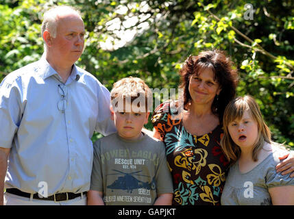 Barry and Margaret Mizen with their children George and Samantha stand in the grounds of St Thomas More School in Eltham South East London, where their son, 16 year-old Jimmy Mizen was a student. Jimmy Mizen was murdered in an unprovoked attack on Saturday. Stock Photo