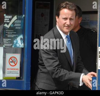 Conservative Leader David Cameron talks to police officers during a visit to Crewe & Nantwich to campaign in the by-election. Stock Photo