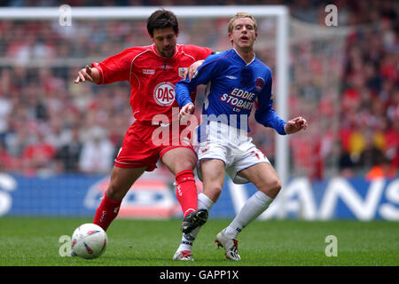 Soccer - LDV Vans Trophy - Final - Bristol City v Carlisle United. Bristol City's Tommy Doherty (l) and and Carlisle United's Stuart Green battle for the ball (r) Stock Photo