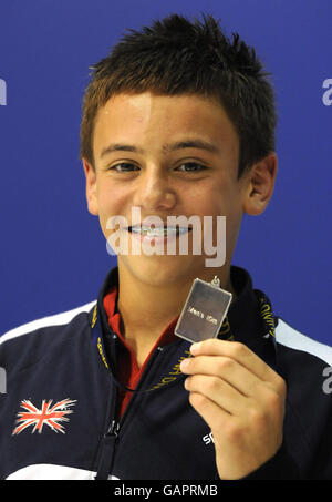 Great Britain diver Tom Daley with his silver medal after taking part in the Individual event during the FINA Diving World Series at Ponds Forge, Sheffield. Stock Photo
