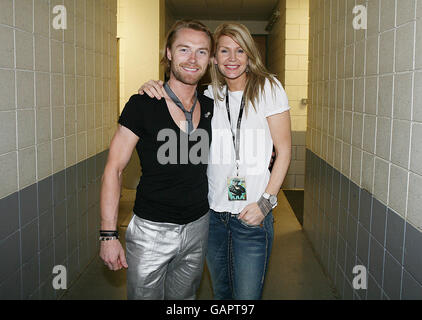 Ronan Keating of Boyzone with a his wife Yvonne Connolly backstage after performing at the Odyssey Arena Belfast. Stock Photo