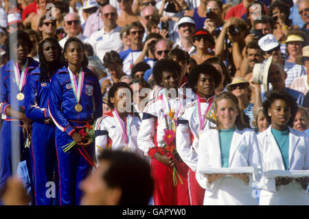 The Great Britain 4x100m relay team who won the bronze medal in the Los Angeles Olympic games. From left, in red and white tracksuits, Simone Jacobs, Beverley Goddard, Kathy Smallwood-Cook (hidden behind Goddard) and Heather Hunte. Stock Photo