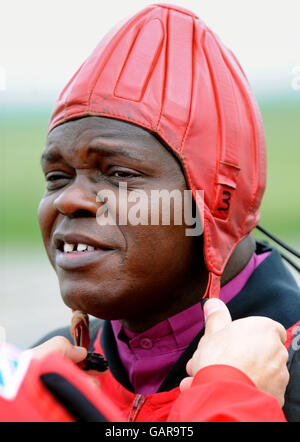 The Archbishop of York, Dr John Sentamu prepares to board an aircraft to take part in a sponsored parachute jump, with a member of the Red Devils parachute display team over Langar Airfield in Nottinghamshire. Stock Photo