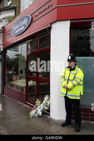 A floral tribute for murdered teenager Jimmy Mizen, outside the Three Cooks bakery in south London where was murdered a week ago. A memory service took place at Our Lady of Lourdes Catholic Church nearby, earlier today. Stock Photo