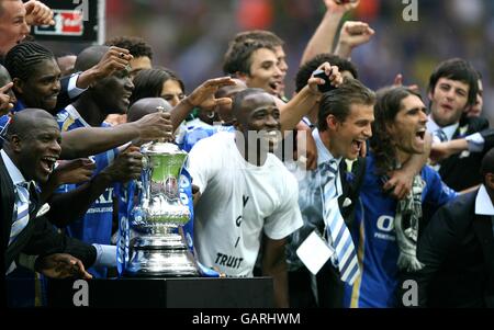 Soccer - FA Cup - Final - Portsmouth v Cardiff City - Wembley Stadium. Portsmouth players celebrate with the FA Cup trophy Stock Photo