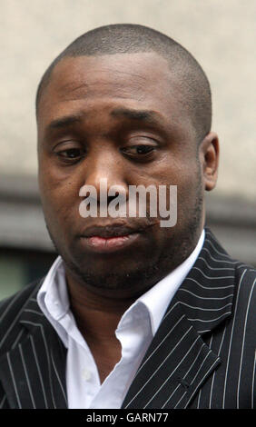 Tony Emmanuel leaves the Old Bailey with a friend after being found not guilty at the Nisha Patel-Nasri murder trial. The cheating husband of special constable Nisha Patel-Nasri was found guilty today of organising her murder. Stock Photo