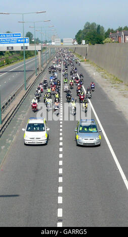 Bikers protest against rising fuel prices on the M62, Salford, in a slow-moving convoy causing rush-hour disruption to the area.