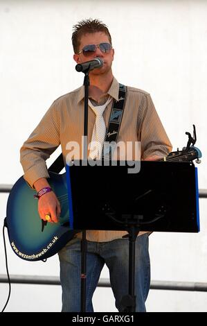 Horse Racing - 2008 Derby Festival - Ladies Day - Epsom Downs Racecourse. Entertainment during Ladies Day Stock Photo