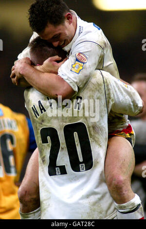 Rugby League - Powergen Challenge Cup - Final - Leeds Rhinos v Bradford Bulls. Bradford Bulls' Robbie Paul and Scott Naylor celebrates Bradford's win against Leeds Rhinos Stock Photo