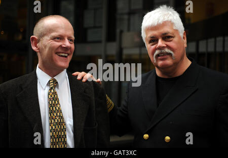 Anti-whaling activist Martin Wyness, left, after losing his court case at Westminster Magistrates Court, London today with the founder and Captain of the protest vessel Sea Shepherd, Paul Watson, who supported Mr Wyness. Stock Photo