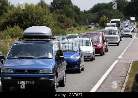 Weekend traffic is disrupted as farmers and truck drivers take part in a go-slow fuel protest along the A31 near Cadnam in Hampshire. Stock Photo