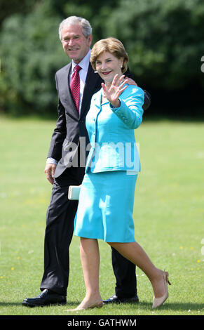 US President George Bush and wife Laura arrive at Windsor Castle to visit Britain's Queen Elizabeth II. Stock Photo