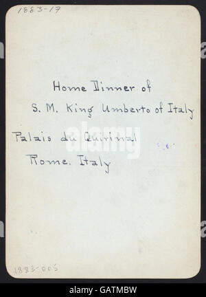 A dinner event hosted by S.M. King Umberto at the Palais du Quirinal in Rome, Italy, likely a formal or diplomatic gathering. The event took place in one of Italy's most notable historic sites. Stock Photo