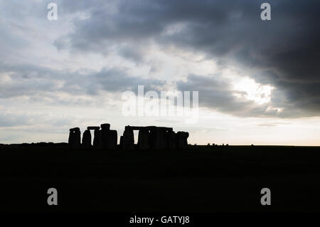 Silhouette pf Stonehenge a cloudy day at dusk. Stonehenge is a prehistoric monument made of a ring of standing stones Stock Photo