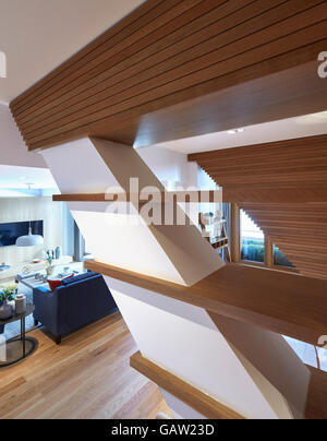 Living room with structural support beams. Apartment in Crown Reach, London, United Kingdom. Architect: Burwell Deakins Architects, 2016. Stock Photo