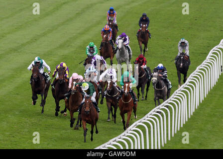Look Here ridden by Seb Sanders (front of group) comes home to win the Juddmonte Oaks at Epsom Downs Racecourse, Surrey. Stock Photo