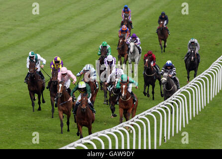 Look Here ridden by Seb Sanders (front of group) comes home to win the Juddmonte Oaks at Epsom Downs Racecourse, Surrey. Stock Photo