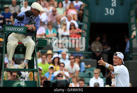 Tennis - Wimbledon Championships 2008 - Day One - The All England Club. Lleyton Hewitt argues with the umpire during the Wimbledon Championships 2008 at the All England Tennis Club in Wimbledon. Stock Photo