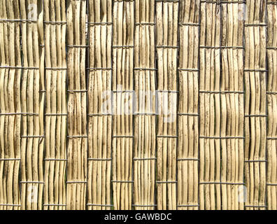 brown weathered bamboo mat weaving texture background Stock Photo