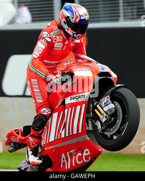 Moto - bwin.com British Motorcycle Grand Prix - Race - Donington Park. Ducati's Casey Stoner celebrates after winning the bwin.com British Motorcycle Grand Prix at Donington Park. Stock Photo