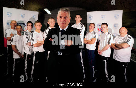 GB head coach Terry Edwards (centre) and the team of boxers and coaches during BOA Boxing Team GB announcement at Fitzroy Lodge, London. Stock Photo