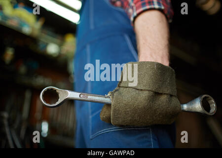 Box-wrench in hand Stock Photo