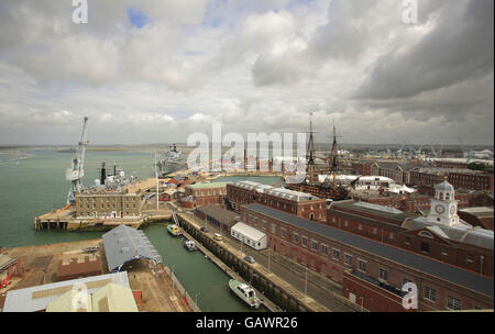 General view of Portsmouth Harbour and Royal Navy Dockyard seen from the top of Semaphore Tower in the naval dockyard in Portsmouth. The Queen's Harbour Master is based at the tower and controls all vessel movements, large and small into the narrow entrance. Stock Photo