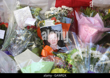 Flowers are left at the scene in Islington, London, where teenager Ben Kinsella was murdered. Stock Photo