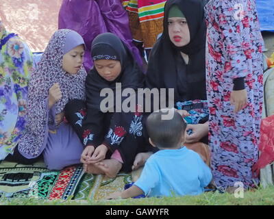 Marawi City, Philippines. 6th July, 2016. Thousands of Maranao Muslim attends Eid ul Fitr celebration outside Provincial Capitol Grand Mosque in Marawi City, Lanao del Sur. The province of Lanao del Sur is composed of 92% Muslim population. Credit:  Sherbien dacalanio/Alamy Live News Stock Photo