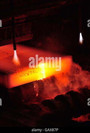 Gas cutting of the hot metal in steel plant Stock Photo