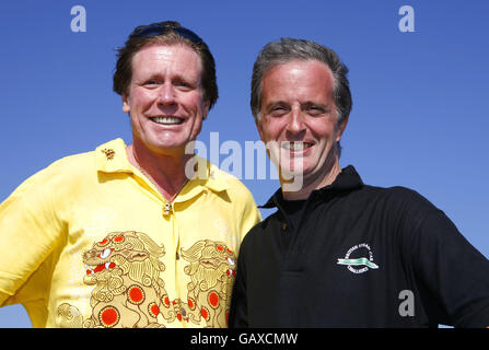 Steam car driver Charles Burnett III (left) and test driver Don Wales, grandson of Sir Malcolm Campbell, at the public launch of the British-built steam car at Thorney Island, near Portsmouth. Stock Photo