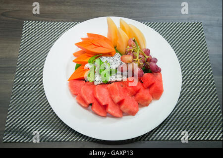 Mixed fruit salad in the bowl . Stock Photo