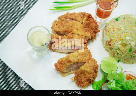Fried rice with fried chicken. Stock Photo