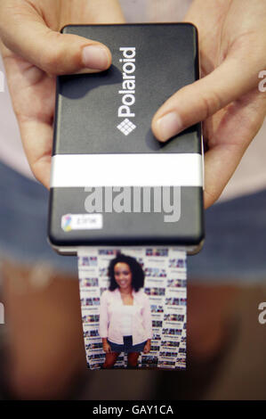 Hollyoaks actress Leah Hackett launches the Polaroid PoGo Instant Mobile Printer at PC World, Tottenham Court Road, London. Stock Photo