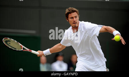 Russia's Marat Safin in action against Spain's Feliciano Lopez during the Wimbledon Championships 2008 at the All England Tennis Club in Wimbledon. Stock Photo