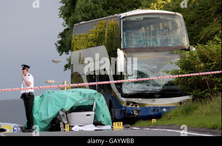 Two killed in bus and car crash Stock Photo