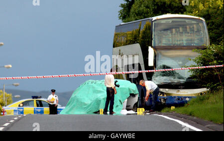 A general view of the scene of a crash involving two cars and a bus in County Antrim where two men travelling in the same car have been killed. The crash occured on the main road between Belfast and Larne, Co Antrim, close to the village of Ballynure, in Northern Ireland. Stock Photo