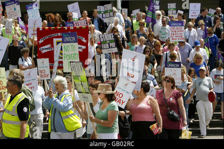 Local government workers from the UNISON and Unite unions, demonstrate in central Portsmouth over a pay dispute. Stock Photo