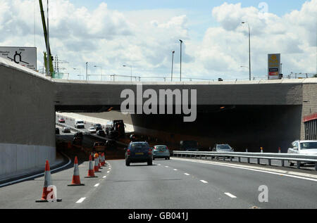 A general view of traffic on the newly opened underpass on the Westlink in Belfast, which opened today 13 months ahead of schedule. Stock Photo