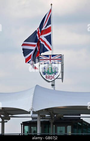 A Union Jack flag above the British Racing Drivers' Club sign, during second practice at Silverstone, Northamptonshire. Stock Photo
