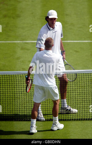 Tennis - Wimbledon 2003 - Men's First Round - Lleyton Hewitt v Ivo Karlovic Stock Photo