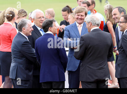 President of the IAAF Lord Sebastian Coe (blue suit, back to camera) meets King Willem-Alexander of the Netherlands at the Stedelijk Museum, Amsterdam. Stock Photo